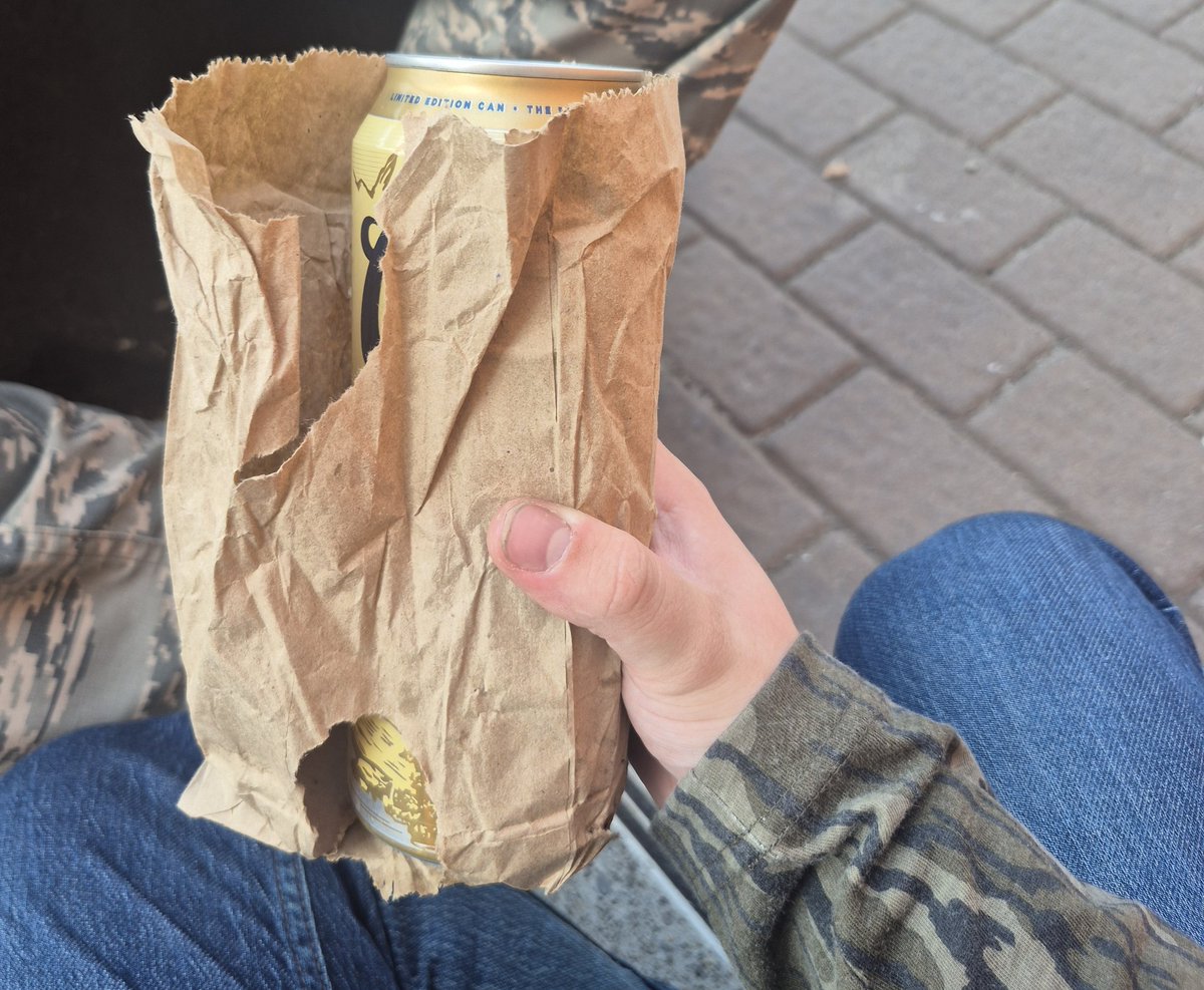 ar_sharpe's tweet photo. doing the social anxiety beer peel but with the paper bag around my coors and getting arrested for violating open container laws https://t.co/Mhq8T60D1L