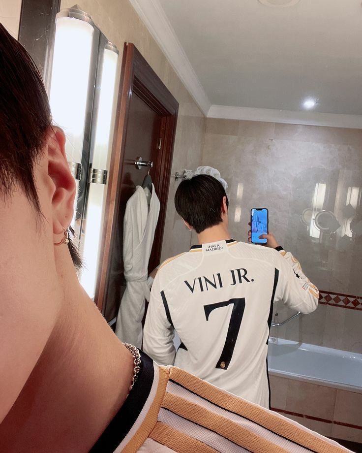 fixonikeu's tweet photo. he’s a real madrid supporter btw, and he’s in one of their star players home country. it was a given he was gonna wear vini’s shirt. please just stop pushing narratives on him when he’s literally just being himself, it’s not fair on him. https://t.co/YLFHZDtoQl