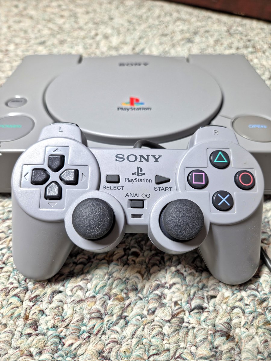 XRPee1983's tweet photo. This my friends is my "audiophile" SCPH-1001 #PS1. 

A slightly more rare model due to it's RCA ports on the back. This beast hooked up to a Sony home audio system will blast them CD'S in style. 

It has been in hiding for about a year.  It is in pristine condition, no sticky residue, no deep scratches, heck there's barely a scuff on it. 

This is my favorite Playstation ever made along with the PS2. #Sony only produced one decent console after the #PS2 in my opinion, the #PS3. 

The brand went downhill from there, & now with the whole "digital" craze coming along, it's dying that much faster, but hey that's just what some common guy like me thinks. 

What's your take🤔?