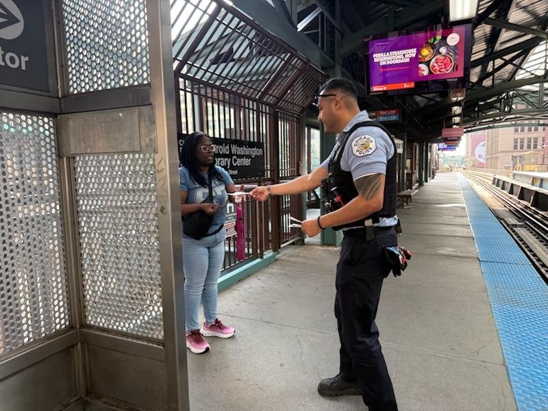CPDTransit's tweet photo. Public Transportation Section Officers at Library-State and Van Buren conducting safety awareness outreach for the ridership. @Chicago_Police @CPD_BCT https://t.co/PR4xl5n9Km