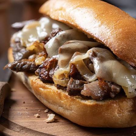 Jo6Pack2's tweet photo. @GaryPetersonUSA Cheesesteaks (yes, not orange oil "cheese" &amp; the real Football 🏈 #GoBirds https://t.co/xcCtPMrCSE