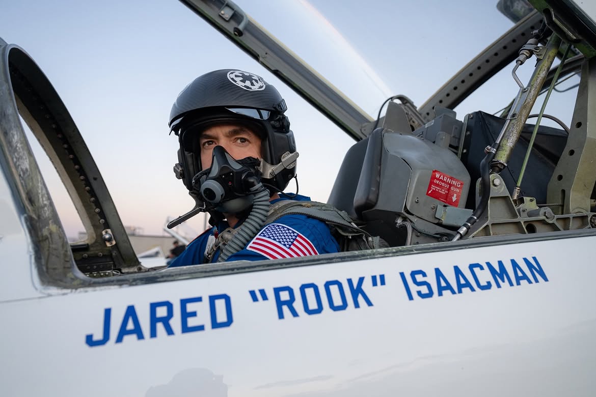 Mach3Plus's tweet photo. NASA Armstrong’s Freedom 250 F-5s looking outstanding, with Jared Isaacman in the cockpit adding a little extra personality to the moment. His helmet carries the Imperial Cog from Star Wars, a fitting touch from a pilot who’s never hidden his love for the franchise. #America250 https://t.co/SfjVkG1fe9