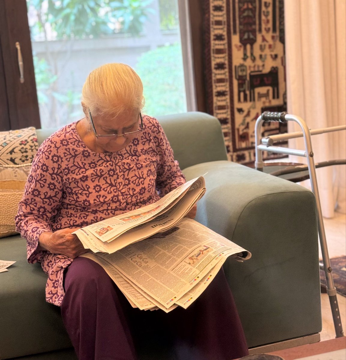 Bharati09's tweet photo. First, this person asks her attendant to bring her the @IndianExpress, which she takes almost an hour to read. 

Then, within minutes, she summons me to deliver @htTweets . She likes it neatly folded so I race through it and fold it back just on time. My husband has switched to the online version. Coz she spends the rest of the morning w it. 

Then she criticises TV news to her attendant in broken words and trembling tones for being incorrect.  She wags a finger at the TV on the wall. 

Because of course, she already knows the correct news.