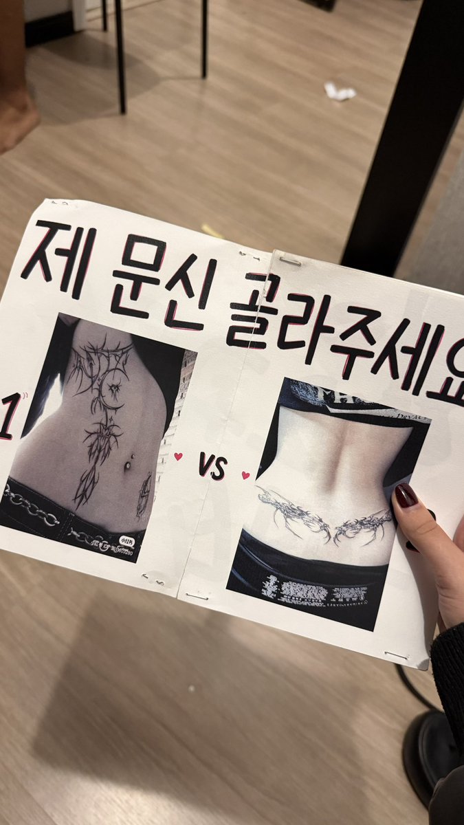 heenniki's tweet photo. JUNGWON READED MY SIGN AND CHOOSE MY NEXT TATTOO 😭😭😭😭😭 thanks to my bestie who SCREAMED his name until he noticed us @woncatyz 
the moment / the sign https://t.co/u4wtSTW3yS