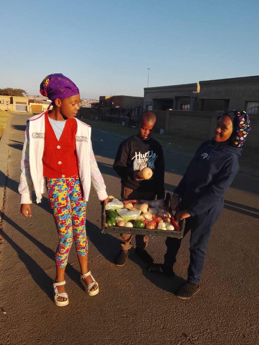 naytholo's tweet photo. Since well schools are closed these kids in our neighbourhood go around selling vegetables https://t.co/825cd8K06P