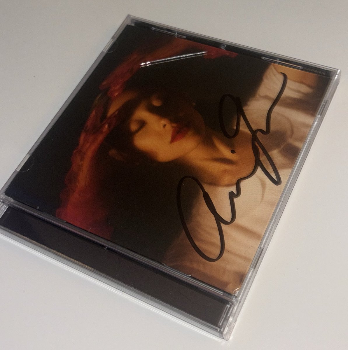 wfysaturnreturn's tweet photo. guys i need money for my dental work coming up so unfortunately i need to sell my eternal sunshine signed CD to afford it, as well as to see ari in concert. work isn’t great rn and i just paid off my student loans so it’s pretty hard. 

selling my signed CD (this is my main one) it’s the long signature, perfectly signed. CD has never been played, booklet has never been opened. this used to be sealed until i opened it up recently. 
there is a small crack on the front, but other than that its perfect. 

please leave your offers below, thank you 🌼

I’m quite sad to let it go but it’s just rough financially atm :(