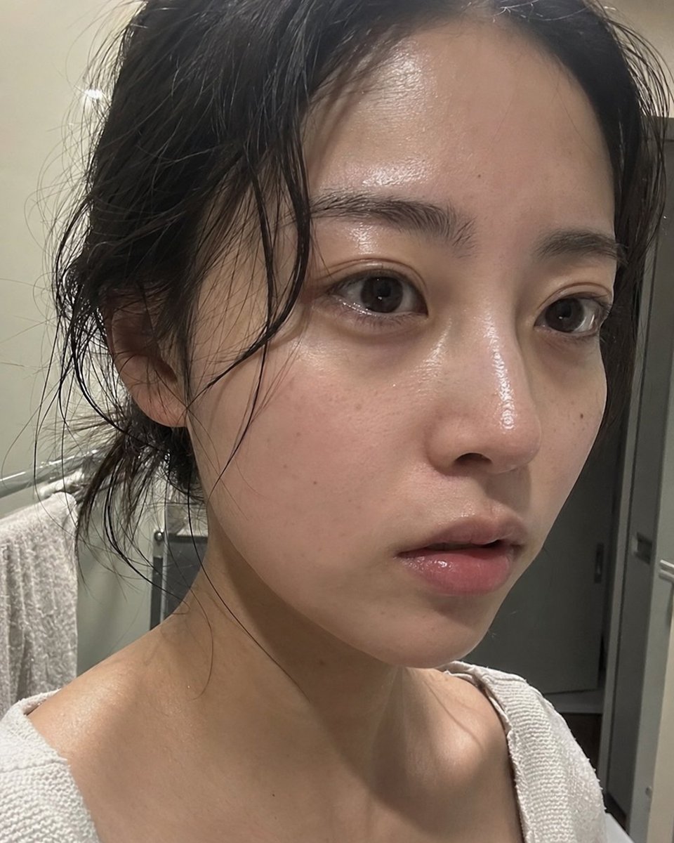 Nine_Shell's tweet photo. I tried generating a close-up “just washed off makeup” face.

Two things kept bothering me:
the redness looked too much like makeup, and when the gaze was off-camera, the eyes sometimes looked dead.

Left: vague off-camera gaze + makeup-like redness
Right: mirror-focused gaze + post-wash skin texture

The fix was adding what the eyes are actually focused on, plus defining the redness as post-wash flush, not blush.

Looks a lot better, right?

No-Reference Prompt Anyone Can Try
prompt below ↓