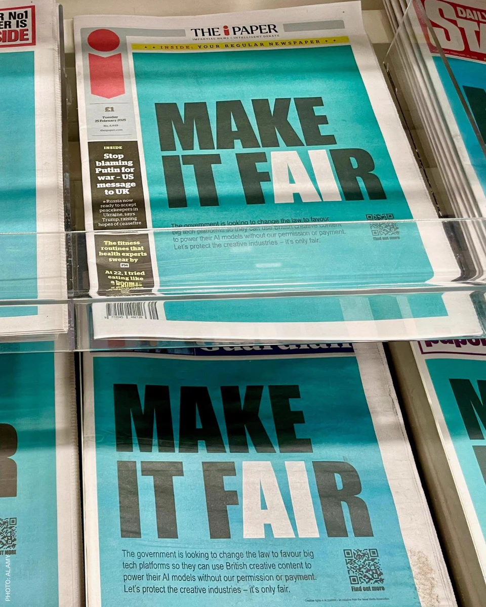 A newspaper cover story with black and white words on a blue background. Text reads: Make it fair.
