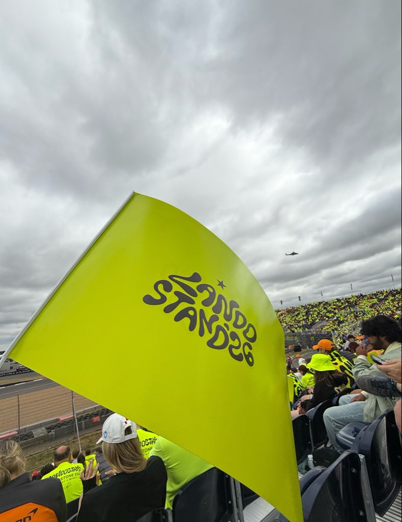 buckethatlando's tweet photo. they’re handing out flags right now! https://t.co/iaOKYPW0nZ