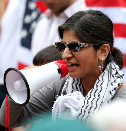 NizNellie3's tweet photo. 🚨  Free-of-charge information for Press Secretary Karoline Leavitt, who may want to put her counterterrorism hat on:

There are currently over 40,000 foreign professors on visas teaching in America. Roughly 72–73% of those are from India.

Upon arriving here, many of them quickly begin participating in protests against America and Israel.

Purdue University professor Tithi Bhattacharya is from India. 

She applied for U.S. citizenship in 2015 after living here for 10 years. She cited the "stress of applying for visas" and the "election of Narendra Modi" as reasons for applying.

I'm uncertain if she's ever received it. I cannot find concrete evidence.

Once she began teaching at Purdue, she had an idea on improving American campuses: "The solution is to de-Zionize our campuses." 

Those are her exact words. This is a taxpayer-funded foreign professor who comes into our nation and has the unmitigated balls to suggest we ban Jews from getting an education.

The professor's social media is riddled with support for U.S.-designated terror organizations. 

She retweeted a post showing a truck that displayed a flag with former Hamas military-wing leader, Abu Obeida on it. She's supporting a genocidal terrorist.

She has participated in numerous campus protests against America and Israel.

You want to help Gen Z? Get rid of the taxpayer-funded filth that's warping their minds.

@PressSec @POTUS @DHSgov