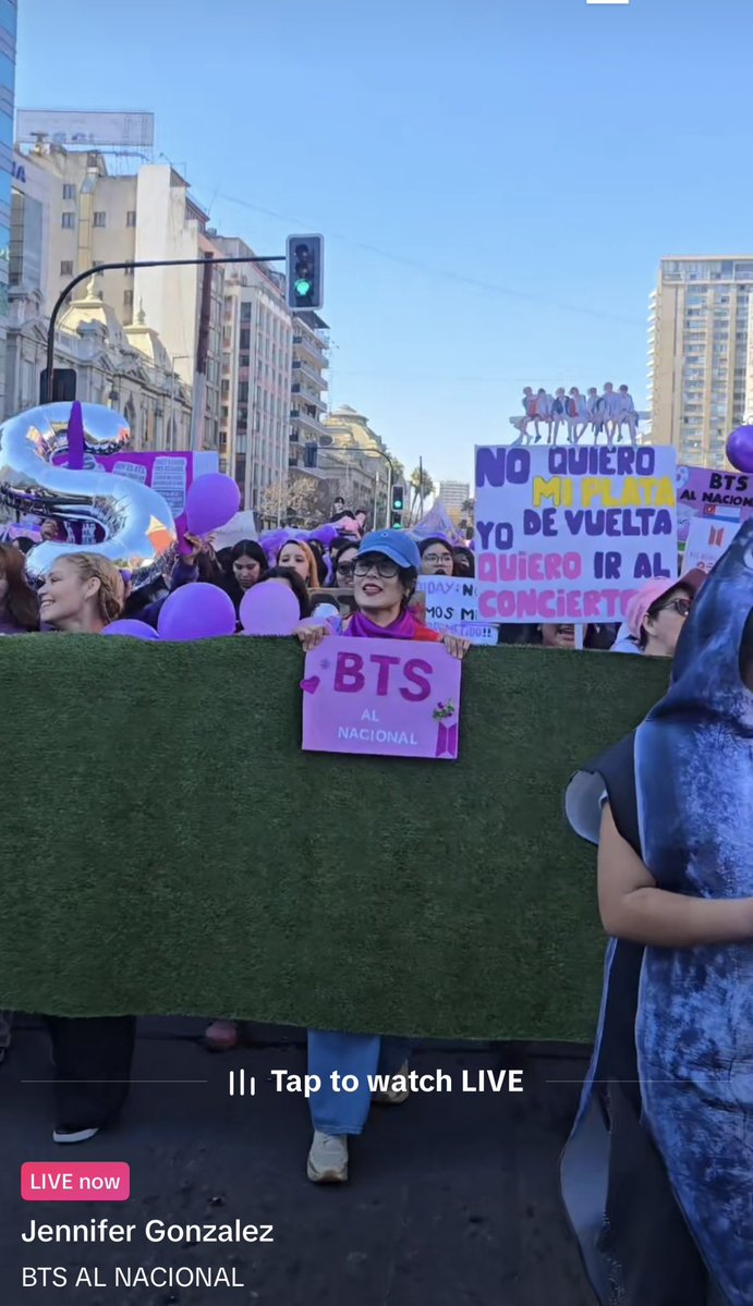tlovesorchids's tweet photo. I opened my tik tok and the first thing I see is a live happening with #BTSARMY marching in a protest in Chile against the officials about the upcoming BTS World Tour ARIRANG concert. They are marching down what looks like a major street and there are a lot of reporters present. I hope they get what they want and this issue is resolved soon! 💪🏽💜