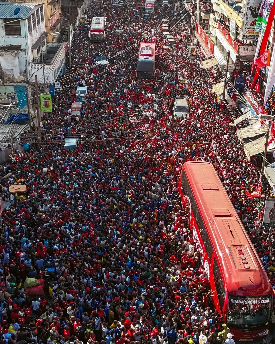 MickyJnr__'s tweet photo. Dar es Salaam is painted red and white today! 🇹🇿✨

Simba SC fans have taken over the city as they celebrate in incredible fashion after their latest Cup victory over Azam.

What a day for the Wekundu wa Msimbazi faithful! ❤️🤍

#AfricanFootball #NguvuMoja https://t.co/5FO720lthT