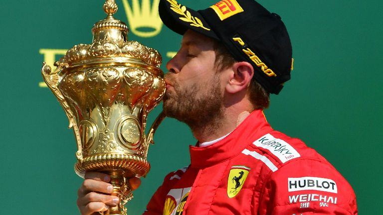 FanaticsFerrari's tweet photo. The stunning Royal Automobile Club Trophy.

It looks so good in the hands of a red racing driver 😍 https://t.co/fWjmP0rtfU