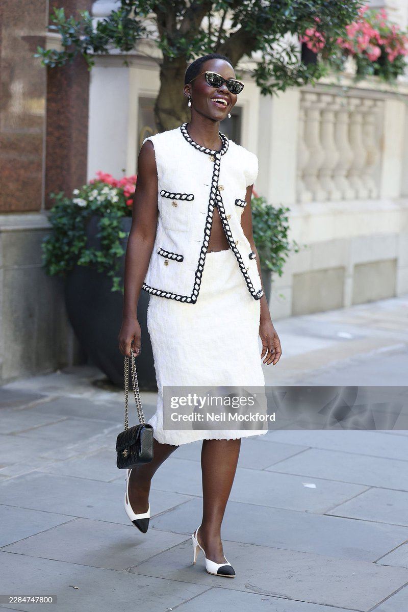 LegendaryLade's tweet photo. Actress Lupita Nyong’o is all smiles in more Chanel!🔥 #TheOdysseyMovie https://t.co/DOI5OcD7n1
