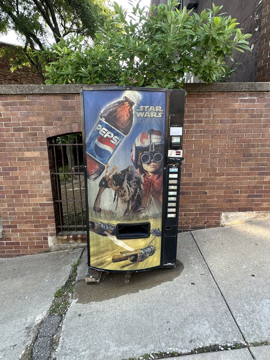 RealCGriff's tweet photo. Swung by Pittsburgh this week and came across this gorgeous Phantom Menace vending machine just on a random street corner. I couldn’t believe my eyes. https://t.co/34kwYgEuTk