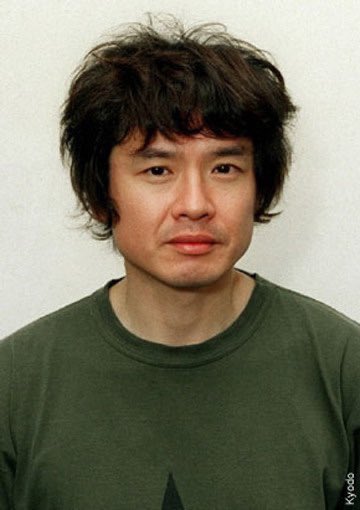 gobIinarchive's tweet photo. Yoshitomo Nara mugshot when he was arrested for this doodle graffiti at the union square subway station that pointed towards his art show https://t.co/LqU4aHmPKu
