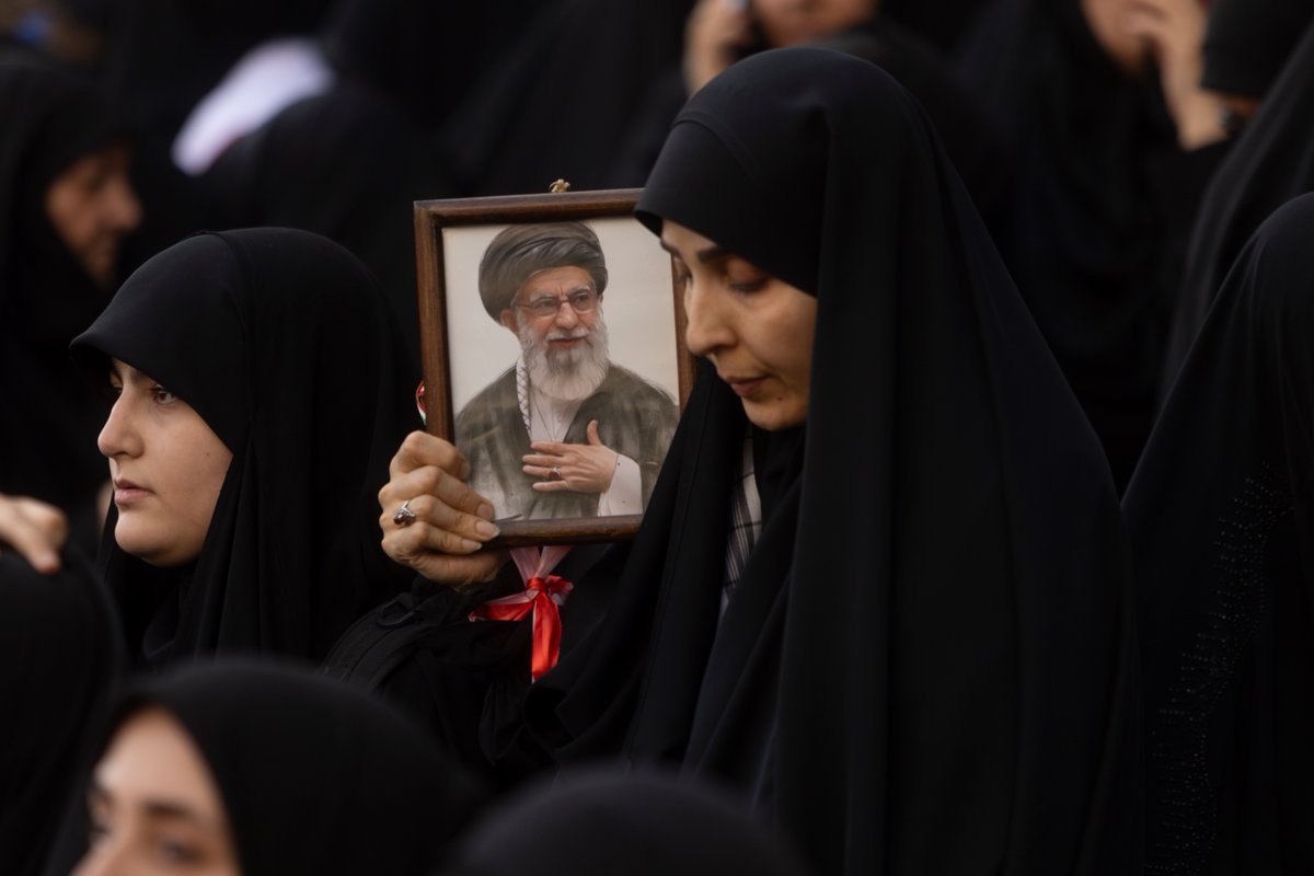 AJEnglish's tweet photo. In pictures: Mourners pay their final respects at the supreme leader’s funeral. https://t.co/o5DPOAsdRx