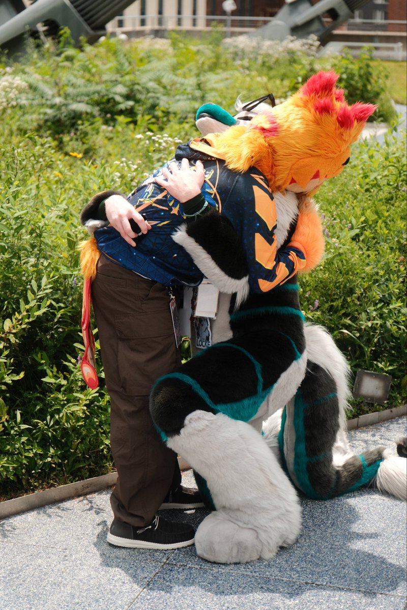 LockeJawDerg's tweet photo. He said yes 🐉💍🐦‍🔥🧡🧡🧡
Photos by the skillful @wakeon_Lan 
#Anthrocon https://t.co/eMCQqTLyhE