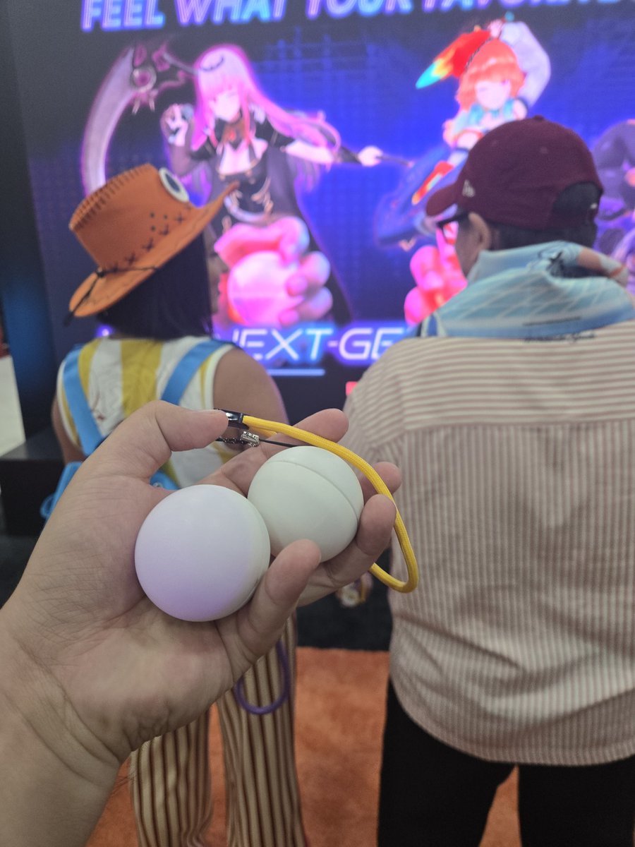 Game8910's tweet photo. I took the time to finally experience what it's like to hold Mori Calliope's stick and balls. I was also not ready for the emotional damage when they played Kiara's Chiku Taku from Myth's 4th anniversary. #Feeltech #AX2026 https://t.co/vR6eA6n2hf