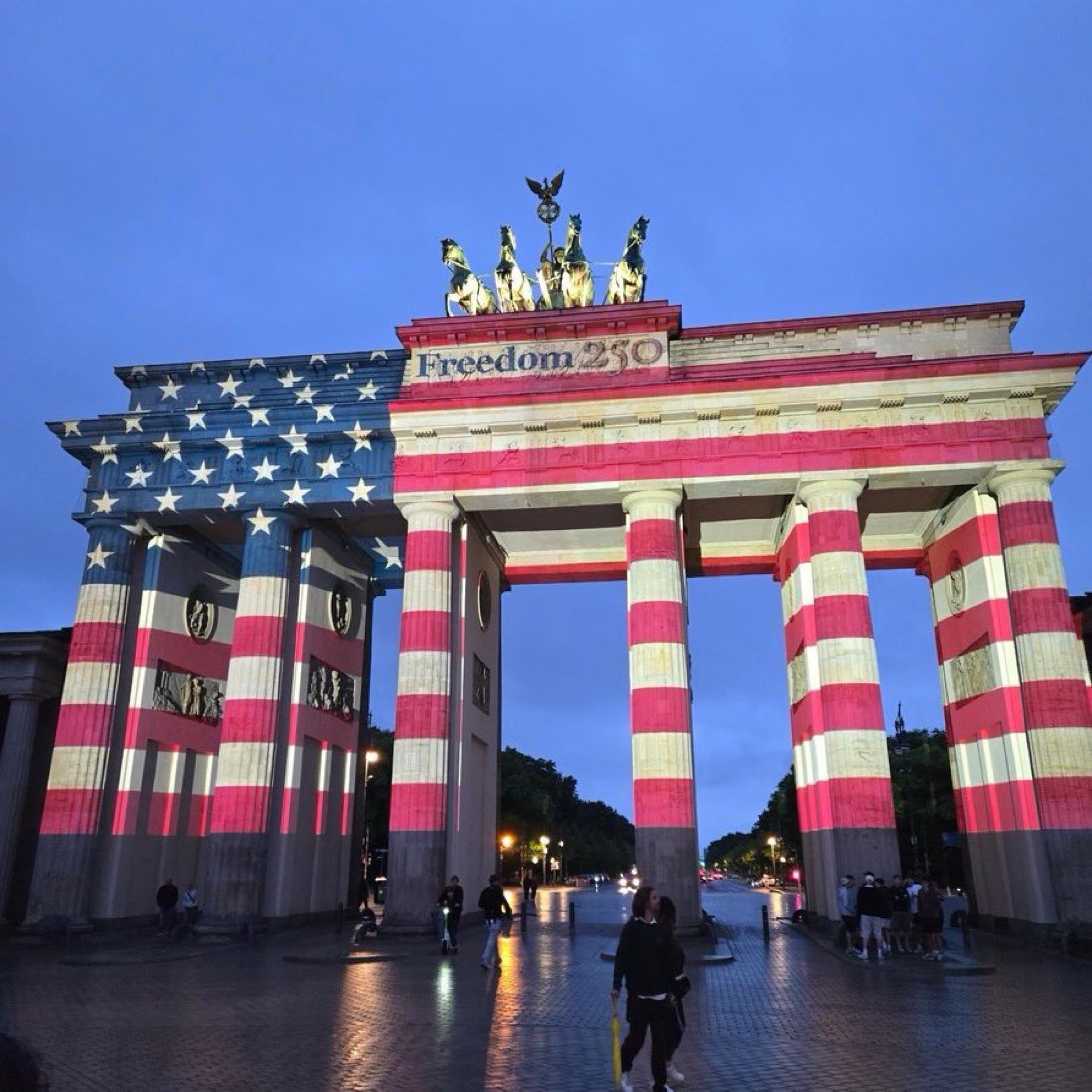 townhallcom's tweet photo. Germany lit up the Brandenburg Gate, the historic landmark that stood in the no-man’s-land of the Berlin Wall until its fall in 1989 and the collapse of communism in Europe, for America’s 250th anniversary.

America continues to be the greatest force for freedom on Earth🇺🇸 https://t.co/uzIFvX3eGQ