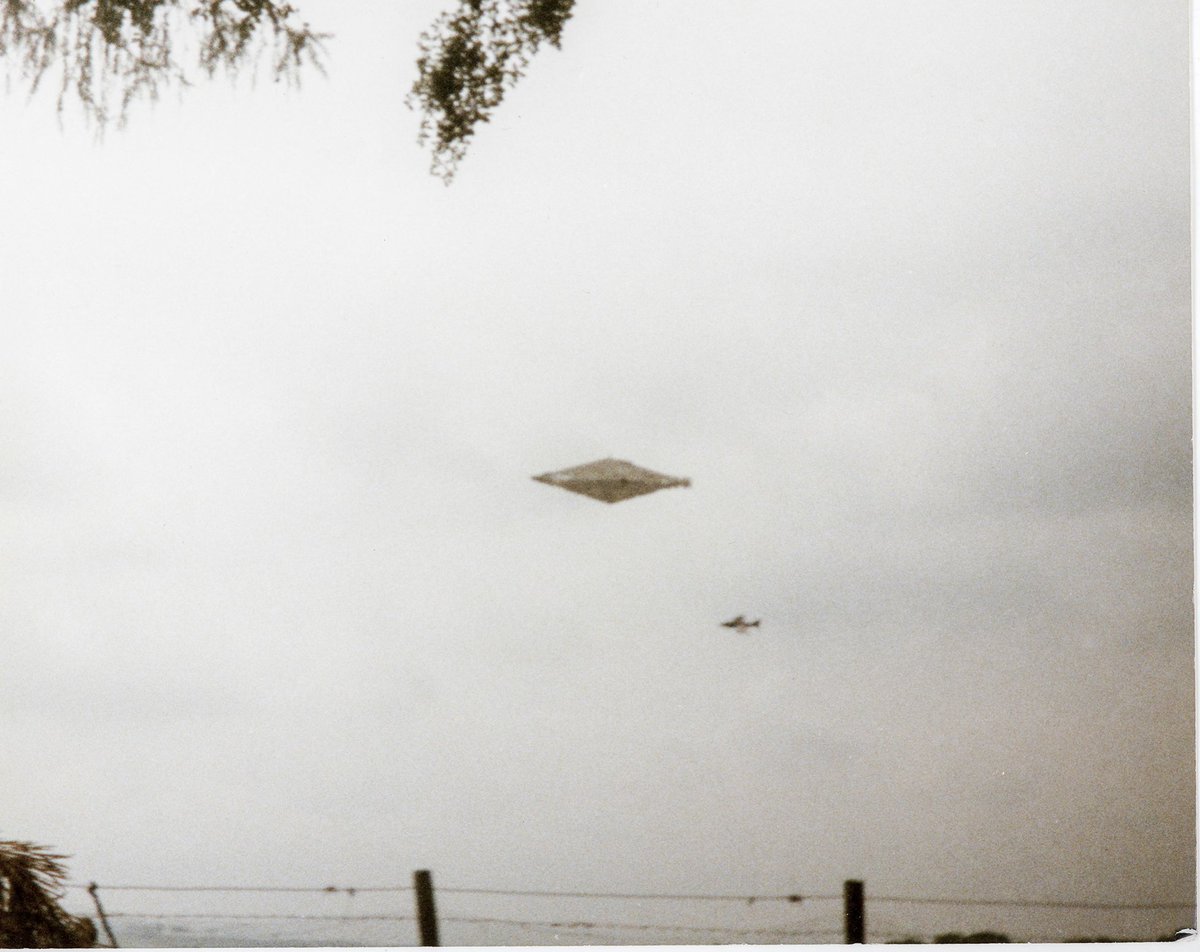 AlienLeaks9's tweet photo. 🚨 Imagine taking one of the clearest UFO photos ever... sending it to the press... and then watching the story disappear. 

That's exactly what reportedly happened in August 1990, when two hikers photographed a mysterious diamond-shaped craft near Calvine, Scotland.

More than three decades later, people are still asking the same question...

What did they really capture? ❗️❗️❗️❗️