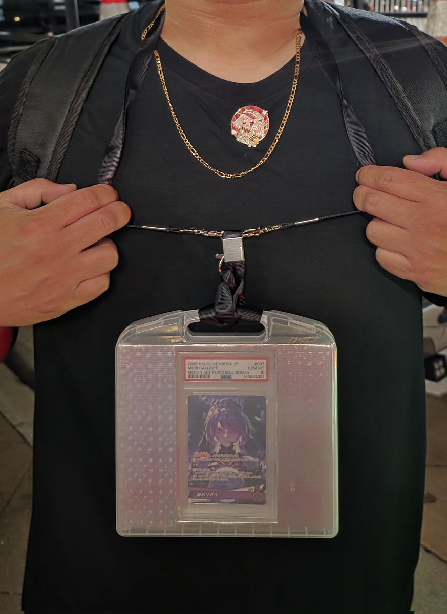 Kuya_Eldrick's tweet photo. Last night was insane! #holoSerendipity the energy levels were top notch! @hololive_En really knows how to put on a show! 
Here's my obnoxious accessory I wore to the concert. Imitating the logan paul charizard necklace. 😂 https://t.co/9T73aIMmrg