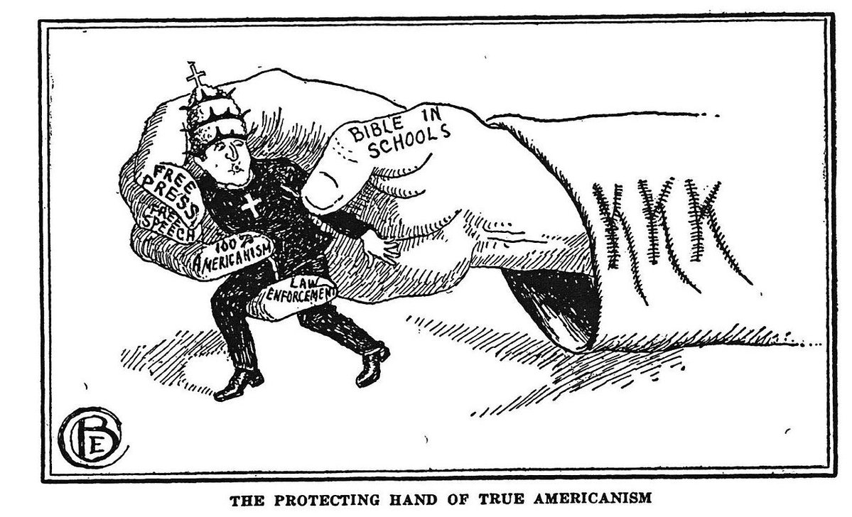 kinisman's tweet photo. One more thing on the topic of “Americanism.” The first Klan was a defensive organization against the terrorism of Yankee carpetbaggers during “Reconstruction.” I don’t think there’s evidence that they used any of the Confederate flags. The imagery was intended as the ghosts of the Confederate dead who had come back to protect their people from the “40 acres and a mule” thieves, and it was quite effective. 

When the second Klan was formed after Birth of a Nation in 1915, the American flag was used prominently for the exact reasons stated in my previous post. The theme was a bold assertion of American Protestantism in the face of millions of papists who were coming ashore from Italy, Ireland, etc. This chimping led to the great immigration restriction of 1924. You may not realize how indebted to the KKK you are for that. 

Now, in movie after movie, the Klan is always depicted with the Confederate flag. That did come along much later, with the third Klan, during the segregation fights of the 1950s-60s, and it spilled over into the 70s in popular culture: state flags, NASCAR, TV shows like the Dukes of Hazzard. Lynyrd Skynyrd and other bands displayed it prominently, and it was a regular article of clothing in the South. This was a common expression of Southern identity. 

By the 90s, pressure against this became relentless, and conformity to the American mean followed. Ole Miss banned the Confederate flag and Colonel Reb. In the gay year of 2015, Governor Robert Bentley of Alabama was the first to remove the flag from public grounds. Nikki Haley did the same in South Carolina days later. NASCAR banned the flag during the Summer of Floyd.

What most people think they know about all of this is taught to them by Jewish media companies, and the fundamentally Protestant motivations of the early 20th century are lost, as are the efforts to reassert regional identity against being more easily controllable imperial proles. That early 20th century energy wasn’t a Protestant faith confined to Sunday morning. It was militant against the effort to overwhelm us with strangers and their strange religion.