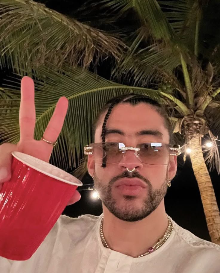 AccessBadBnbm's tweet photo. Un brindis por las noches que no se olvidan 🥂🌴 After shuting down stadiums across Europe, it's finally time for a little summer peace. Hope you all are enjoying the heat and living your best life. Gracias por el amor siempre. 🕊️❤️ #BadBunny #Benito https://t.co/eOUUKjj9VF