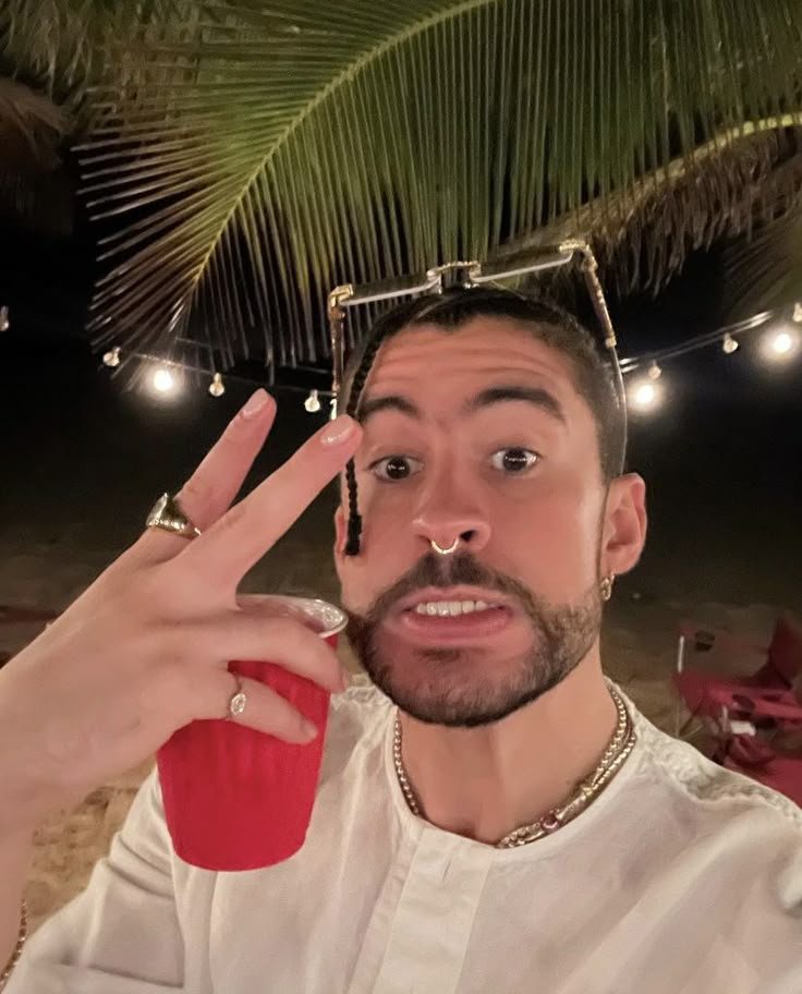 AccessBadBnbm's tweet photo. Un brindis por las noches que no se olvidan 🥂🌴 After shuting down stadiums across Europe, it's finally time for a little summer peace. Hope you all are enjoying the heat and living your best life. Gracias por el amor siempre. 🕊️❤️ #BadBunny #Benito https://t.co/eOUUKjj9VF
