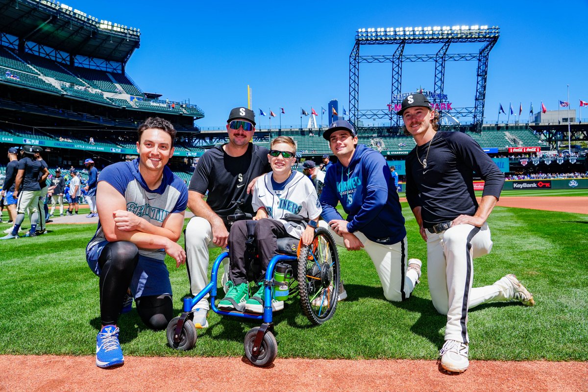 Mariners's tweet photo. One of the brightest days on our schedule 💙

Our favorite tradition returned to the ballpark with Little League Challenger athletes getting the full big-league experience alongside players, families and staff. https://t.co/L7xHz8itSD
