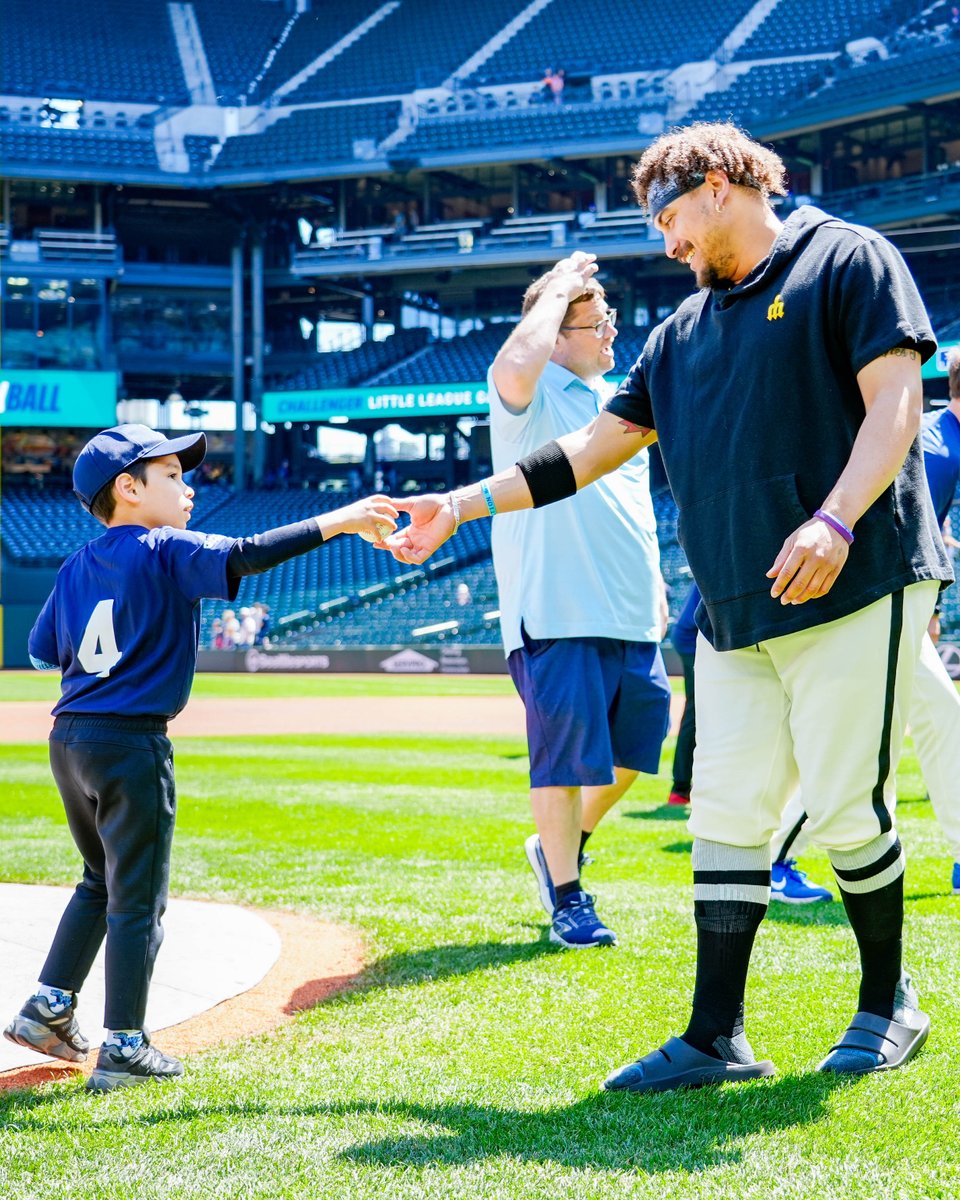 Mariners's tweet photo. One of the brightest days on our schedule 💙

Our favorite tradition returned to the ballpark with Little League Challenger athletes getting the full big-league experience alongside players, families and staff. https://t.co/L7xHz8itSD