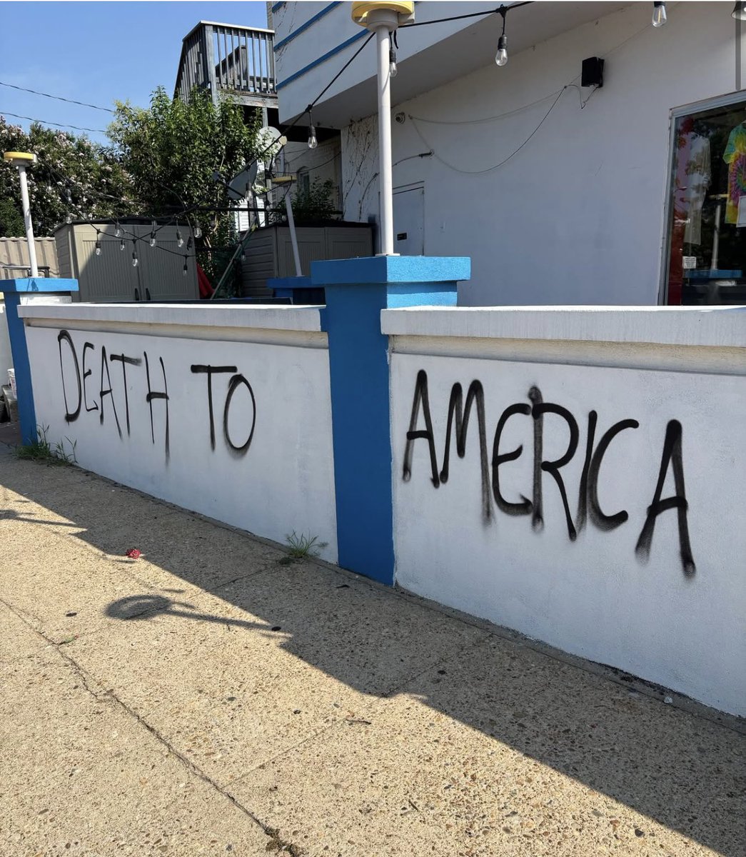 MichelleMaxwell's tweet photo. This happened in Richmond, VA and I am sure is coming to a town/city near you. You ok with this America? 

“While our employees were off celebrating America's 250th, some clown decided to write "Death to America" on Texas Inn Richmond's patio wall, during an Anti-4th "fundraiser" at Bandito's last night at 12:26 am. 

The concert promoters are coming back to paint over it tonight at 7 pm.

They know who did it. I have security footage. If it's not repainted to my satisfaction, charges will be filed. 

I've never been this angry.”