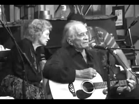 crockpics's tweet photo. Johnny Cash delivering his final public performance at the Carter Family Fold in Hiltons, Virginia, July 5, 2003. A spectacular, deeply emotional look at the Man in Black honoring his music and his late wife, June Carter Cash, just two months before his passing. 

During his brief 30-minute set, he performed timeless staples like Folsom Prison Blues and I Walk the Line. Right before strumming the opening chords to Ring of Fire, he paused to tell the emotional crowd that June's spirit was visiting him that night to give him inspiration, just as she always had. Seated just behind him at the piano is June's cousin, Janette Carter, who spent her life keeping the Carter family musical legacy alive