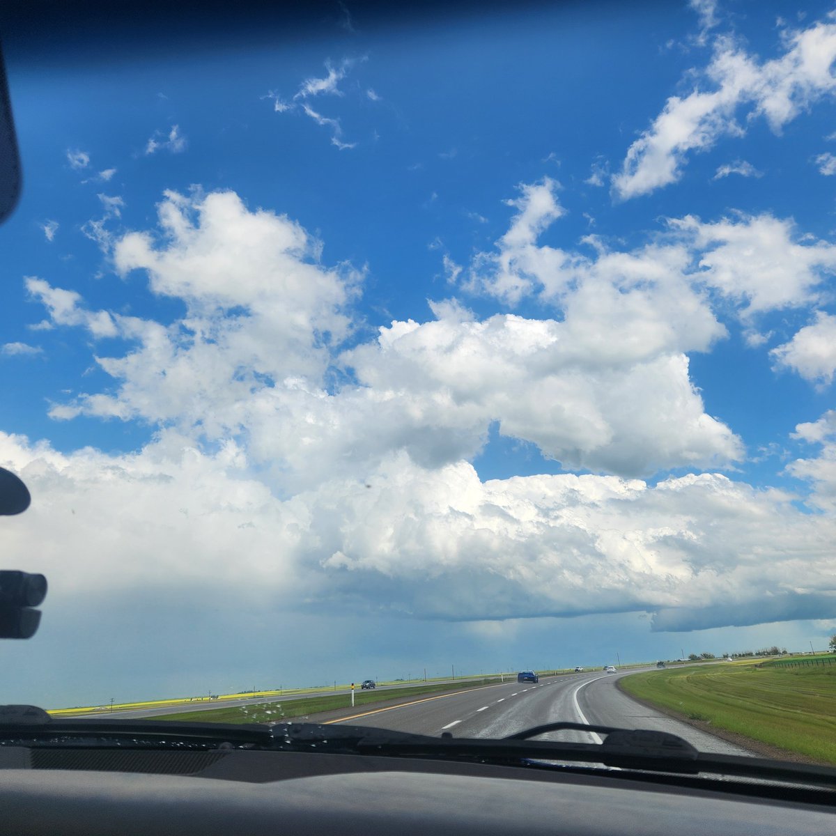 Terracote09's tweet photo. @HouckisPokisewx This is the backside. I'm 20 mins behind just south of Nanton. #abstorm https://t.co/UwjqeL6SYw