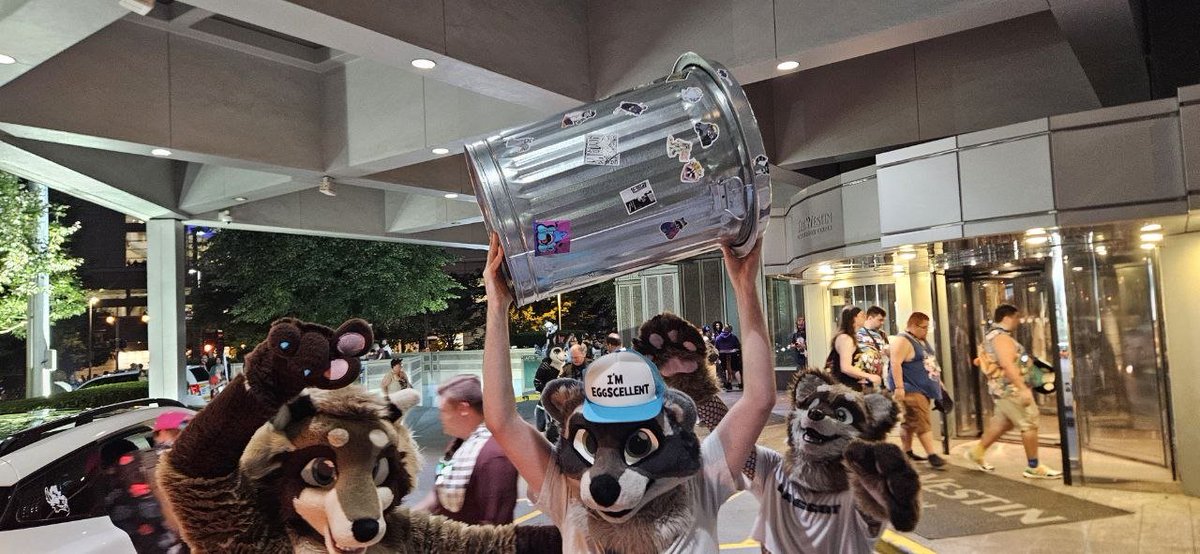 TimbitBandit's tweet photo. Impromptu text from the raccoon gang asking me if I want the trashcan from the group photo at AC26 and I said yes. So we drove from the hotel to the con as fast as we could 🥹 TYSM ❤️ Hopefully we can meet at MFF https://t.co/jqtu8ZTEcd