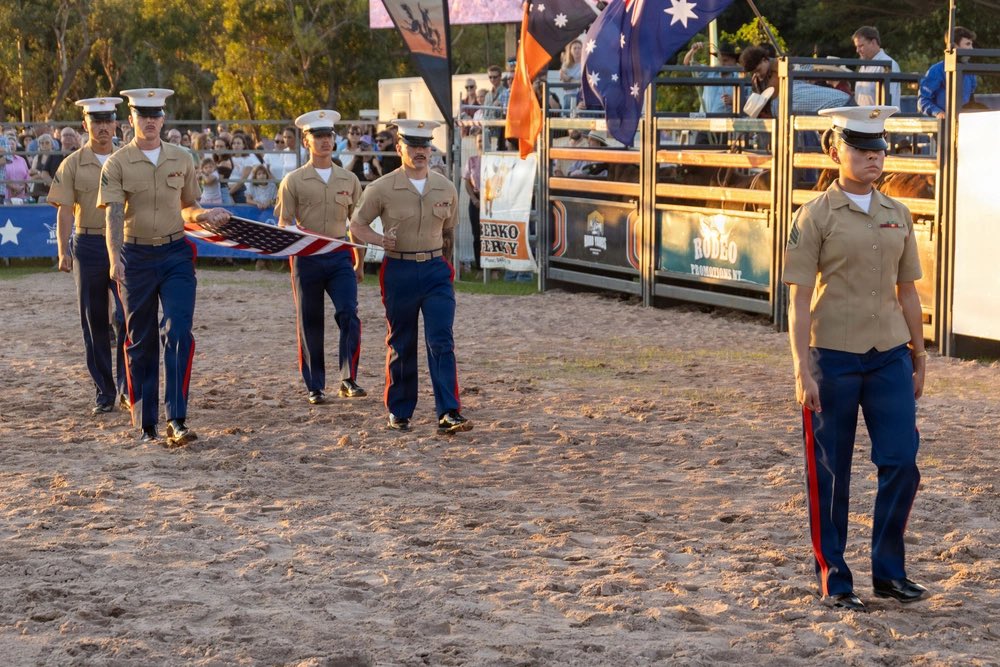MRFDarwin's tweet photo. Not our first rodeo🇺🇸🇦🇺🐂

U.S. Marines with VMM 268, MRF-D 26, presented the colors and sang the national anthem at the Top End Bull Spectacular 2026 in Darwin, Australia, July 4, 2026.

📸Lance Cpl. Andrew Whistler

#USMC #America250 #TopEndRodeo #MRFD #Marines #Darwin https://t.co/sDGFbGjciy