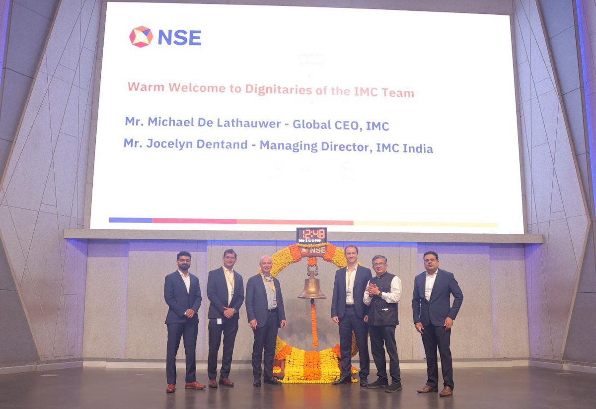 NSEIndia's tweet photo. Our MD & CEO, Shri Ashishkumar Chauhan rang the @NSEIndia bell, along with Mr. Michael De Lathauwer, Global CEO, IMC, Mr. Jocelyn Dentand, Managing Director, IMC India and other dignitaries from the IMC Team.
Mementos in the form of the NSE Bull Frame, and NSE Bell were presented, as part of the visit. 

#NSE #NSEIndia #VisitToNSE #IMC #IMCTrading @ashishchauhan