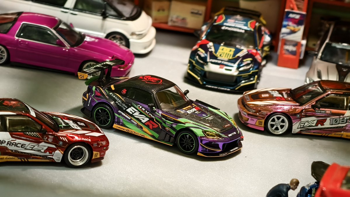 Giga_Penguin's tweet photo. Inno64 J's S2000 EVA Racing 🤗

Same casting as previous release but wrap in EVA livery. Bought the Inno bundle at TMCS just for this

I got lucky with this, this is the "hidden" model and it comes in chrome paint. 

Goes ridiculously well with other EVA 🤗

#164scale #164diecast https://t.co/b0PiyOWuCW