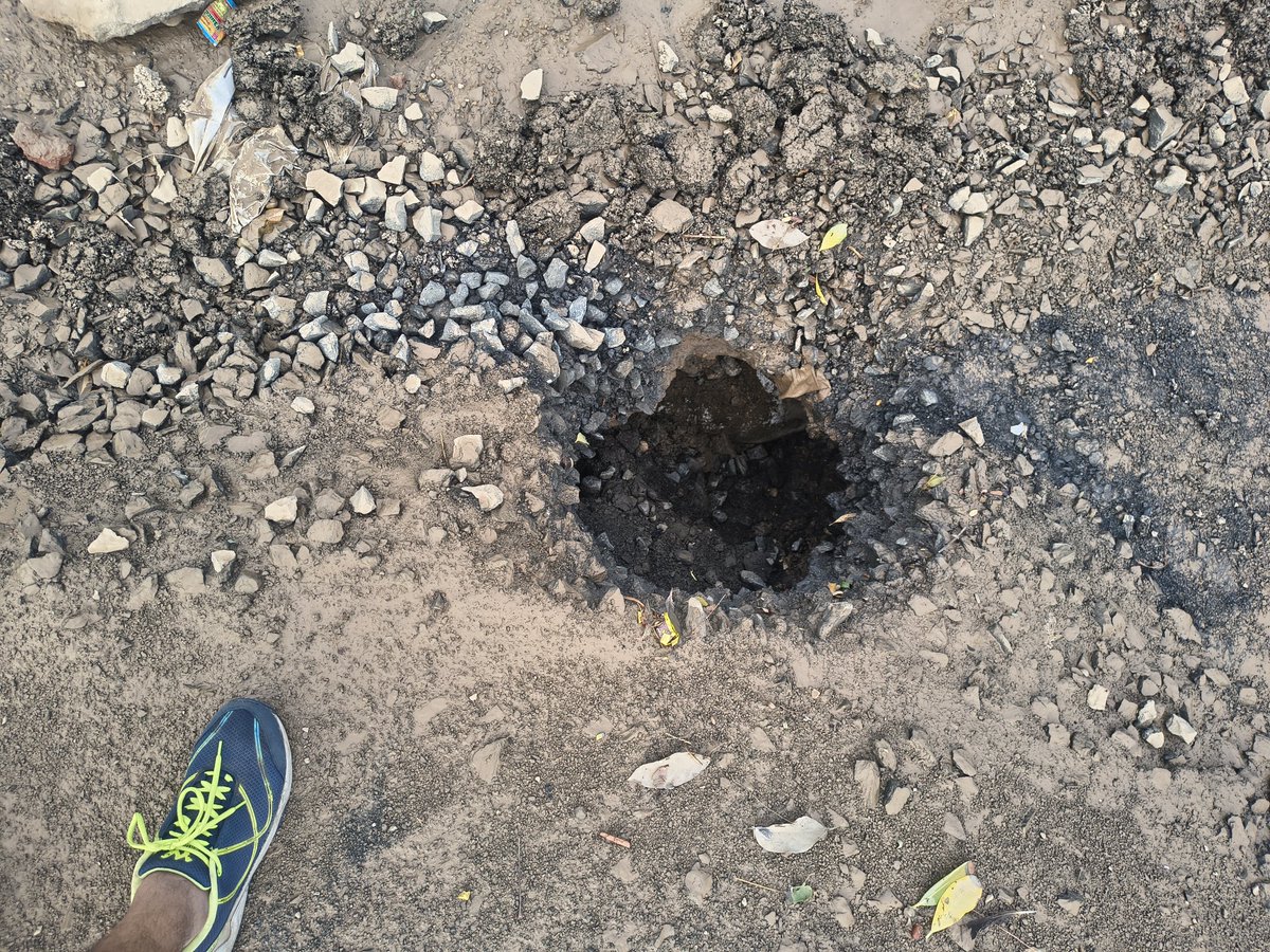 HirendrasinghCh's tweet photo. Yesterday Night we had heavy rain and new road conditions worsen and  R&amp; B team was so quick in covering and trying to put under carpet. Today 2 jcb started working from 8 AM and doing patch work. It's not going to sustain for long. Right authority  to review  / take action. https://t.co/s84B7Lhkmh