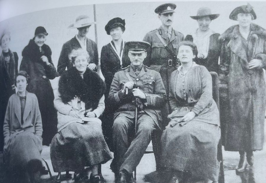 DrHelenFry's tweet photo. Senior members of the MI5 Registry, with SIS Assistant Director Lieutenant-Colonel Maldwyn Haldane seated in the front row, photographed on the roof of MI5 headquarters in 1918.

The Registry served as the operational heart of the organisation, managing vast paperwork, maintaining detailed record indexes, and overseeing recruitment.