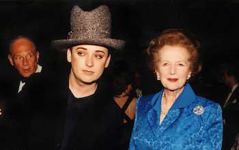 BoyGeorge's tweet photo. The idea, that as a gay man, I should join the noise and slag of political leaders is just a laughable cliche. When anyone asks me about 'President Donald Trump' I tell them we share a birthday. It shuts them up instantly and stops me having to have another boring, predictable, ethereal, conceptual conversation about someone I have never met. I would happily take a photo with the president to add to my collection. PS. I love America.