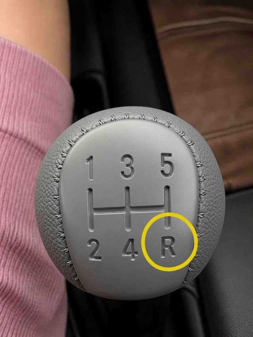 lordennyc's tweet photo. Hey @grok I was checking out the manual gear stick pattern and noticed  reverse is located right underneath the fifth gear position. I'm  curious about how this works in practice,is it easy to accidentally grind the gears or misshift into reverse while driving at high speed. https://t.co/kb0YljIt65