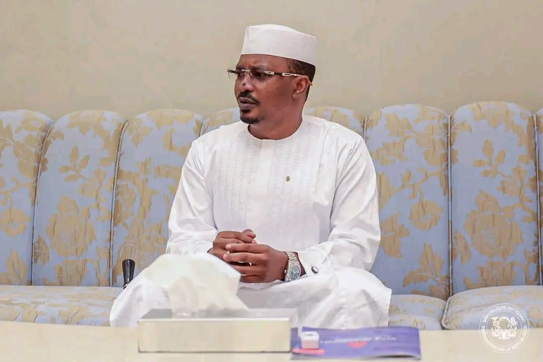 hassanal_Prof's tweet photo. #Chad 🇹🇩 #Novel395 #DiplomaticShame #AbuDhabiDowngrading #KakaHumiliated #MopProtocol #SAMPreciousMetals #KouriBougoudiGold #TheReality #H23
🇹🇩CHAD IN NOVEL N°395: THE LOUNGE OF PROTOCOL SLAVES – OR HOW ABU DHABI MUTATED THE MARSHAL INTO A CLANIC MOP
Location: The white marble palaces of Abu Dhabi, the padded salons of His Highness Sheikh Mohamed Bin Zayed Al Nahyan, and the tarmac of the international airport of national shame where Chadian sovereignty was bargained away at wholesale price in this month of July 2026.
Theme: The clinical protocol and political autopsy of Mahamat Idriss Déby Itno’s (Kaka) diplomatic downgrading in the United Arab Emirates; the erasure of sovereign institutional ministers in favor of the inner-circle clan and cocaine-tainted generals; and the regional geopolitics of the begging bowl facing the masters of the Gulf.
CHAPTER I: THE HORIZONTAL ALIGNMENT OF SUBMISSION – THE COLLAPSE OF STATE PRECEDENCE
The curtain rises on an official photograph that will live in the annals of national infamy. In textbook manuals of international diplomacy and state precedence, spatial configurations are sacred. Two heads of state are received face-to-face or side-by-side, strictly separated by a decorative center table to visually establish the sovereign equality of nations. The visiting dignitary sits to the right of the host. Accompanying delegations, meanwhile, remain standing in the back or line up along the sides according to a strict hierarchical order.
The Logical, Critical, and Geometrical Analysis : What a magnificent lesson in institutional contempt delivered by the Emiratis to N'Djamena's ruling junta! Look closely at the imagery sold by the Palace’s propaganda apparatus. The principle of reciprocity and symbolic equality has been thoroughly trampled. Mahamat Kaka was not received as a Head of State embodying a sovereign people, but as a local gang leader horizontally aligned on the exact same sofa as his administrative subordinates.
Even worse, the spatial layout insults basic administrative sanity: being seated on the same physical row as his personal aide-de-camp, the young Ousman Dicky—whose entire role is limited to carrying folders and providing close protection—while having General Goudjé Gueillet Hemchi (Director General of #ANSICE, freshly tarnished by the cocaine scandal of Novel N°393) sitting immediately next to him with coffee in hand, is an absolute protocol suicide. Placing a president of the Republic on the exact same footing as a personal assistant and an agency director proves that to Abu Dhabi, the Chadian delegation is not a sovereign government: it is merely the management committee of a regional branch. By constantly stretching out the begging bowl for financial oxygen, you eventually accept being treated like a mop.
Tumultuous Interrogation: Since when does a Marshal's personal aide-de-camp possess a diplomatic rank allowing him to sit on the same horizontal row as the host president of the United Arab Emirates? If the protocol of political Absurdistan validates that an shadow general suspected of narco-procuring can invite himself to the table of kings with his coffee cup, what is the structural difference between an official state visit and an informal Am-Djarass family meeting?
To be continued...
HassaИ Al-ProfessoЯ
