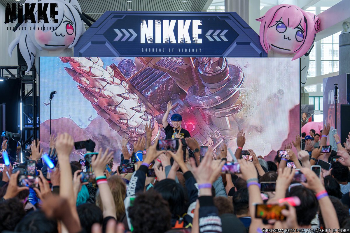 NIKKE_en's tweet photo. 【NIKKE ANIME EXPO 2026】

Commanders, thank you for joining us for the Dev's Secret Mission at Anime Expo 2026!

Together with Director Yoo, we finally unveiled the secret mission—a special DJ performance by Cosmograph! 🎧

We hope you enjoyed this special surprise from the Devs.

Thank you for spending an unforgettable time with us. Until we meet again, Commander!

#NIKKEAX2026