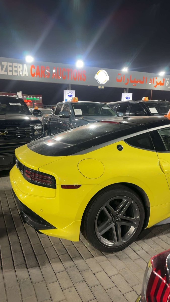 FrankDoe101's tweet photo. First time seeing the Nissan Z in person, and my intrusive thoughts immediately said, “Whip it.” 😂✌🏾

Sadly, you don’t get to drive cars at auctions… so I just stood there imagining the soundtrack. 🏁🔥🚀

#YourCarGuy 🚘🕺🏽
#YourDubaiCarGuy 🇦🇪🇬🇭 https://t.co/C3pu6PfL09