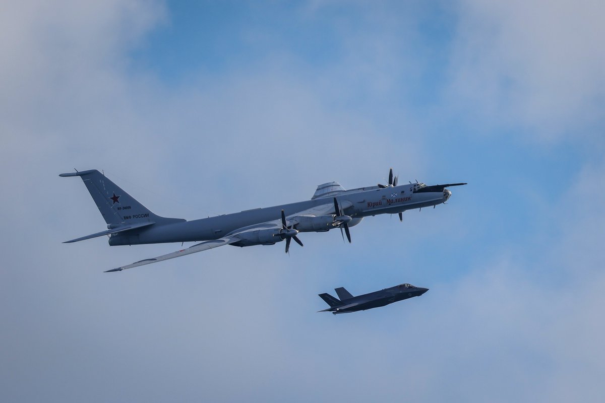 DefenceHQ's tweet photo. While operating in the Norwegian Sea on Operation FIRECREST, the UK's Carrier Strike Group was approached repeatedly by a Russian 'Bear-F' maritime patrol aircraft.

The aircraft flew unnecessarily close to HMS Prince of Wales, dropped multiple sonobuoys nearby, and failed to respond on international safety frequencies.

This activity was unsafe and unprofessional.

Two UK F-35s from HMS Prince of Wales intercepted and escorted the aircraft until it left the area.

The Carrier Strike Group continues to operate with @NATO allies in the High North, reinforcing security across the Arctic and North Atlantic.