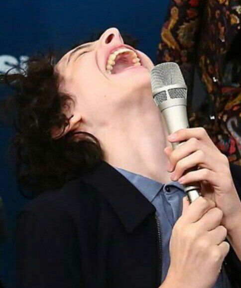 finn wolfhard laughing tweet media