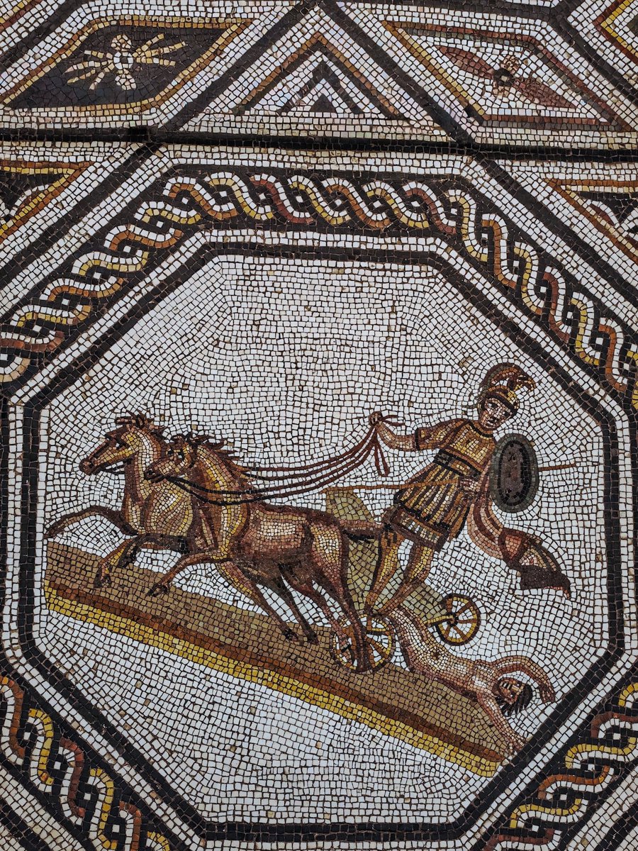 antmoose's tweet photo. "So he spoke, and thought of foul treatment for glorious Hector. He pierced the tendons of both feet behind from heel to ankle, and bound them with ox-hide thongs to the chariot..." In this #emblema, an oddly undramatic depiction of the Iliad's climax for #MosaicMonday. https://t.co/kG4POjugYn