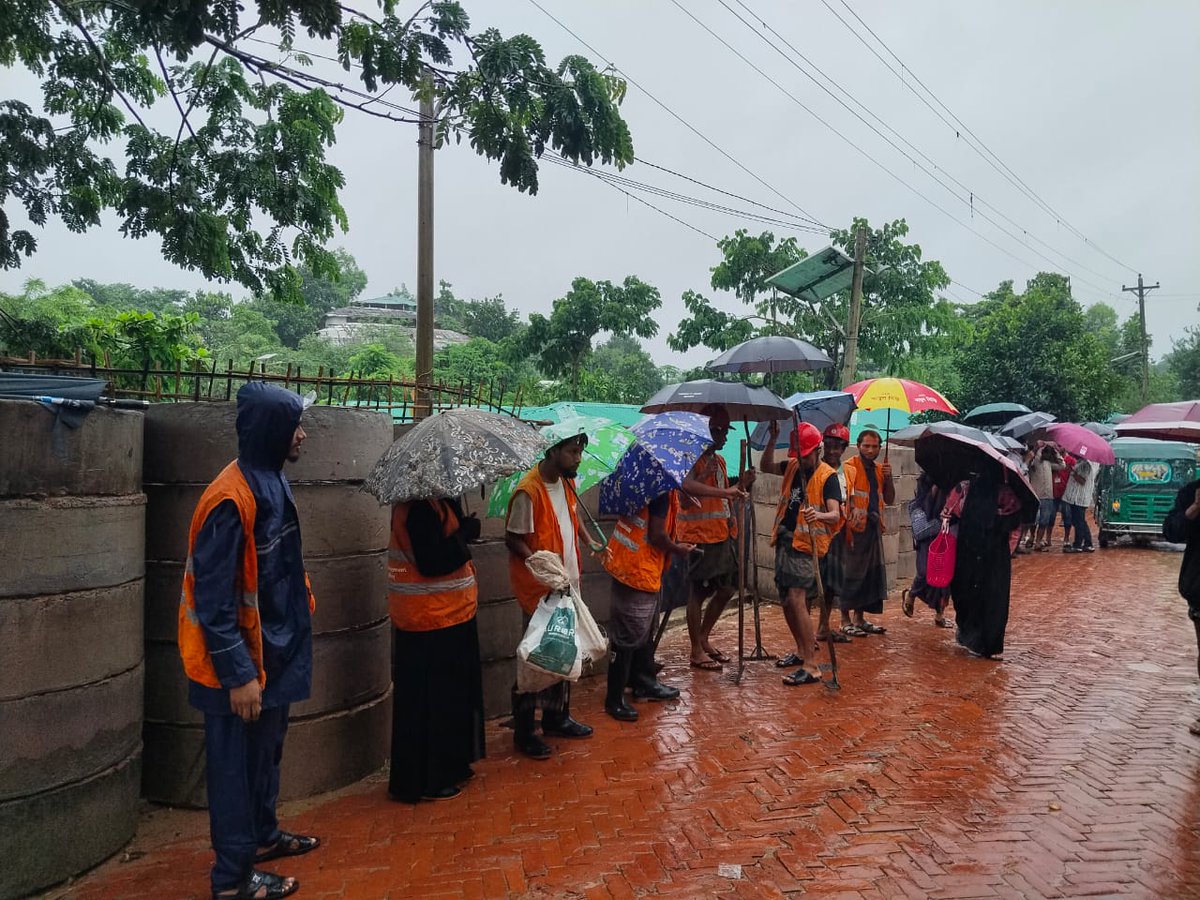 WFP_Bangladesh's tweet photo. In the wake of devastating landslides in the Rohingya camps, WFP teams are providing immediate food assistance and supporting recovery efforts on the ground. More than 2,000 people will receive support starting today. #wfpbd50 https://t.co/xRBr0V4nxl