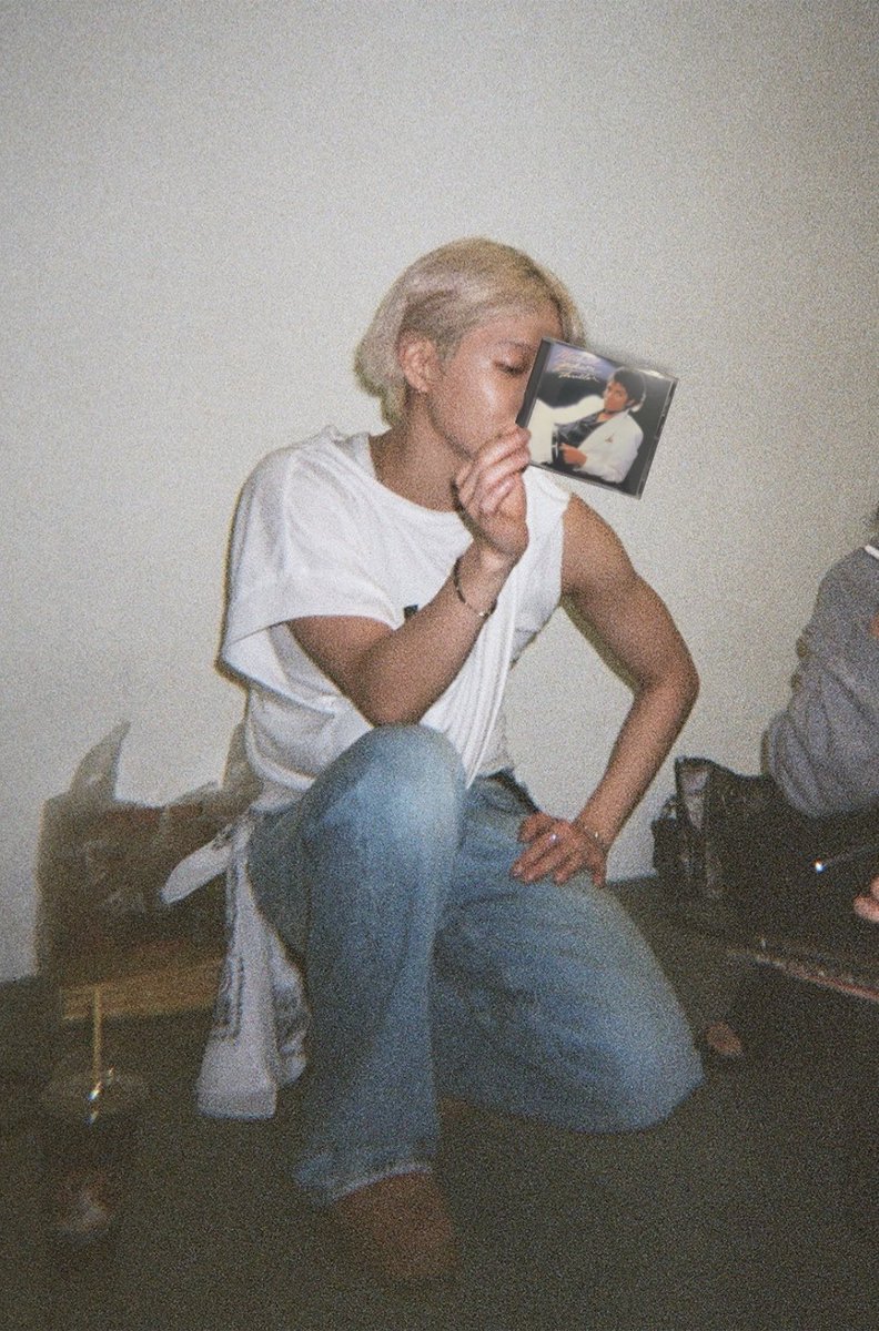 taemjjs's tweet photo. taemin holding the best selling album of all time #taemj https://t.co/P5dD5u8pu3